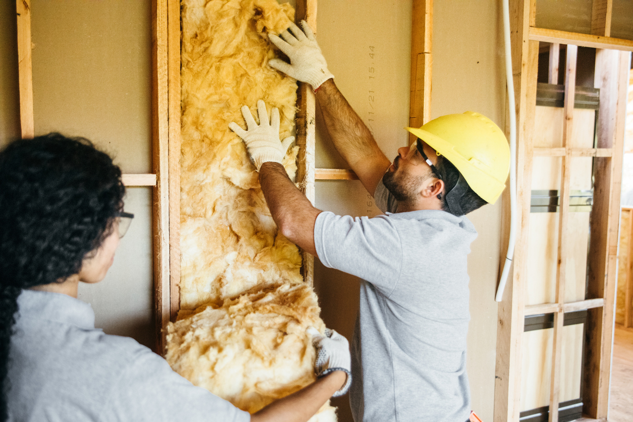 installing insulation inside attic